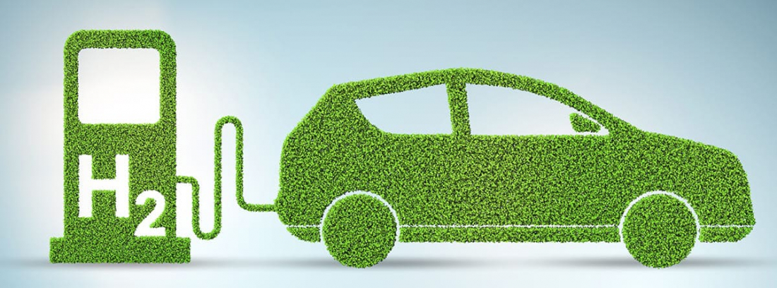 coche verde conectado a un punto de repostaje de hidrógeno